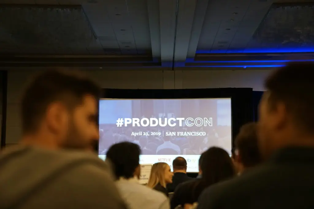 A PowerPoint presentation in front of a large crowd, using a range of visualization features.